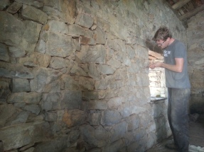 Dave picking out old mortar